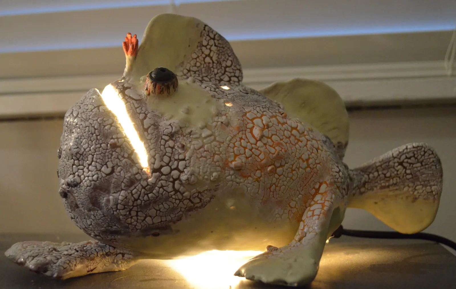 Hand-built ceramic frogfish lamp